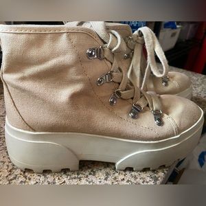 Beige chunky sneakers.